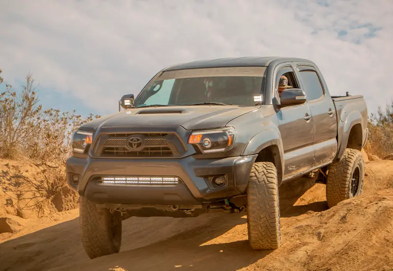 Cali Raised Low-Profile Ditch Light Mounting Kit For 2005–2015 Toyota Tacoma – Includes Canbus-Compatible Pods With Blue Backlighting (Small Size) 1